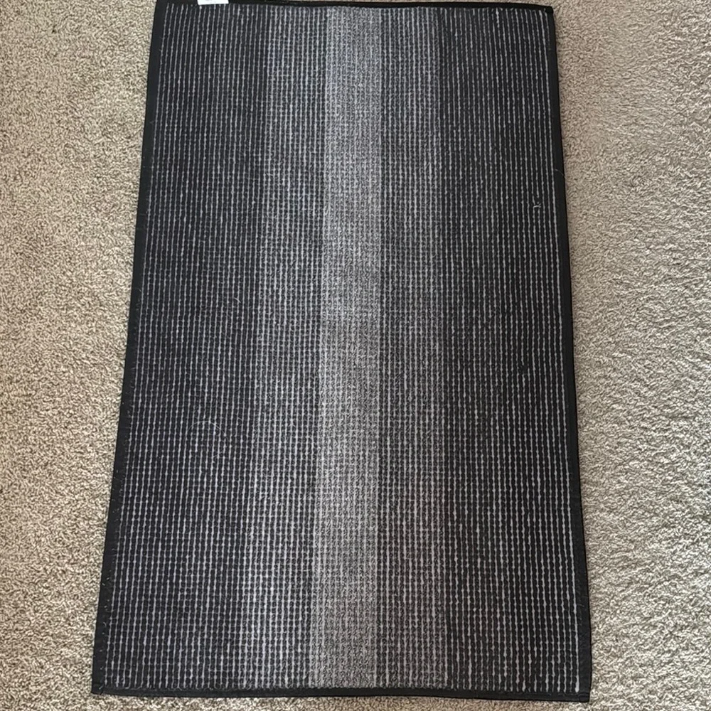 Elegant Black and Gray Striped Rug